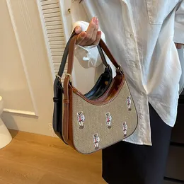 wholesale ladies shoulder bags 2 colors literary fan cartoon embroidery mobile phone bag niche design canvas handbags light color matching leather handbag 5911#