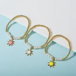 Braccialetti di fascino Xuanyu Fashion Sun Colore Acrilico perle dorate perle femminile jjewelry 18k dot hip-hop di bracciale elastico di alta qualità.