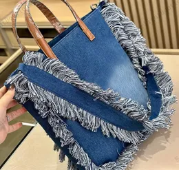 Designer de canal de bolsa jeans Grand Shopping Smoking Tote Travel Designer Mulher Sling Body Bolsa mais cara com moda versátil da cadeia de prata