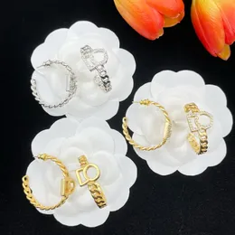 Orecchini di moda di gioielli designer in metallo alfabeto a cerchio rotondo incorporato