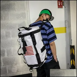 حقائب في الهواء الطلق Lism Fashion Men Women Women Backpack Backpack Large Capaciy Travel Travel Bag Male Sport Gym Litness Cylinder Hip Hop Drop Dropress S ot2mg