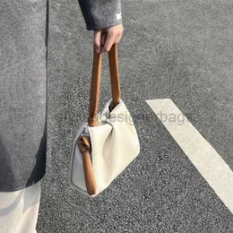 2023 Tidig vår veckad väska för ny stil liten fokus mode kontrast färg en crossbody moln vatten hink bagsstylishdesignerbags