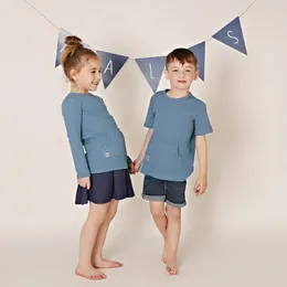 Moletons moletons moletons crianças camisa de manga longa bolso unissex flexível e confortável tecido round round round phirt menino meninas 230815