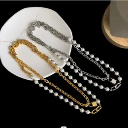 Neu gestaltete Mode 925 Silvert-Letter-U-förmige Schnalle Metallkette Perlen Lock Anhänger Halskette Titanstahl Armband Ohrring Designer Schmuck T089100