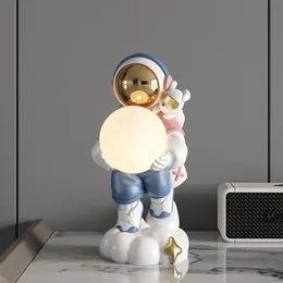 Oggetti decorativi in ​​resina astronauta lampada luna ornamenti creativi opere originali gravi artigianato adorabile decorazione del desktop decorazione per ufficio regalo 230815