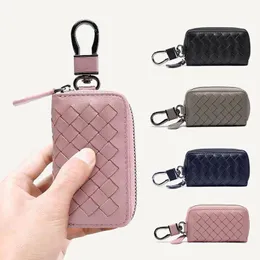 Designerin echter Lederauto Key Case Luxusmarken Mode Einfache exquisite Mini-Handgewebe Unisex 2023 Neu