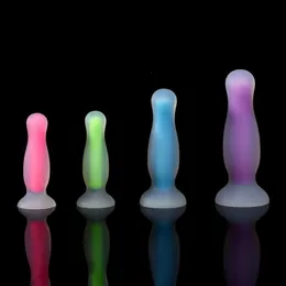 Анальные игрушки Новые светящиеся анальные заглушки светятся в темно -красочном задних заглушке Anus Dilator для взрослого простаты массагер -массагер