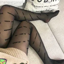 23SS Designer Cucci Sexig Long Stocking Tights Kvinnor Fashion Thin Spets Mesh Channel Soft Breattable Hollow Letter Stockings Blacki7xyhijg