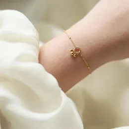 Urok bransoletki Rhysong Fashion Proste mini 18 -karatowe złoto Cute Ball Charms Ręka biżuteria ze stali nierdzewna Bransoletka dla kobiet dziewczyna