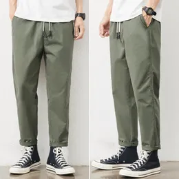 Calça masculina calça jovens respiráveis ​​cor sólida cor de cintura média de vestuário de vestuário