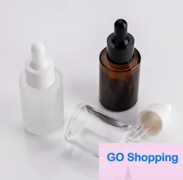 Wholesale 30ml Flat Shoulder Frosted Clear Amber Glass Round Essential Oil Serum Bottle With Glass Dropper for cosmetics