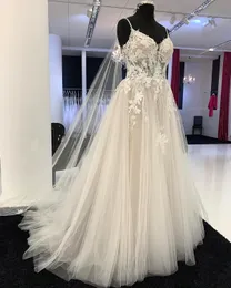 2023 Arabic Aso Ebi Ivory Lace Beaded Beach Wedding Dress Spaghett A-line Backless Bridal Gowns Dresses ZJ2022