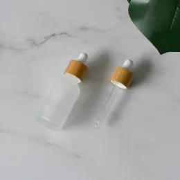 Cosmetic Packaging Container Supply 30ml Natural Bamboo Wooden Dropper Bottle Frosted Glass Dropper Bottle with Wood Cap Top Quality