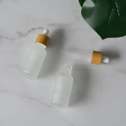 New Cosmetic Packaging Container Supply 30ml Natural Bamboo Wooden Dropper Bottle Frosted Glass Dropper Bottle with Wood Cap