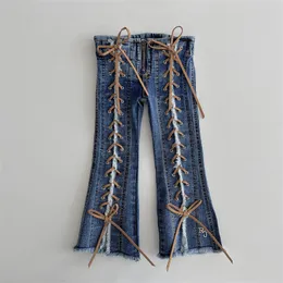 Ins Girls Cross Bind Jeans Fashion Kids Love Heart Pocket Denim Fleared Pants Children Zipper Boot Cut Cowboys byxor S0422