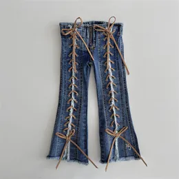 INS Jeans incrociati per ragazze Moda bambini amano il denim con tasca a cuore Pantaloni svasati per bambini Pantaloni da cowboy con cerniera Boot Cut S0422