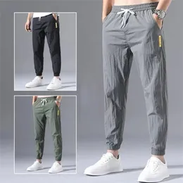 Męskie spodnie swobodni mężczyźni w stylu letnim moda na świeżym powietrzu Lekkie luźne chłodne jogging sport duży rozmiar pantalonów pour hommes 230824