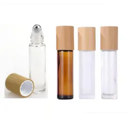 Packing Bottles Wholesale 10Ml Glass Essential Oil Clear Amber Roll On Oils Bottle Bamboo Lid Stainless Steel Roller Ball Drop Deliv Otzld