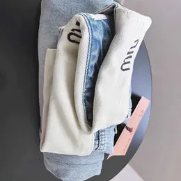 2024 nuovi jeans da donna pantaloni a gamba dritta a vita bassa Miu Roll vita lettera ricamo pantaloni firmati donna aspetto sciolto sottile e coprire i fianchi