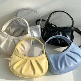 School Bags Simple crossbody bag women's allmatch ins niche Korean version of fashion portable pleated cloud 230828