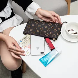 卸売携帯電話バッグ女性用コイン財布手首袋就学視夏のシンプルな旅行女性の財布