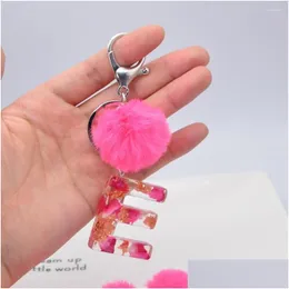 Keychains Lanyards Red Rose Petal Gold Foil Filling 26 Letters Keychain With Pink Pompom Key Ring Exquisite Resin Holder Women Bag O Dhubj