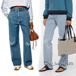 Designerskie dżinsy Dżinsy Jean High Waist Street wydrążona plaster haftowana dekoracja swobodna niebieska proste dżinsowe spodnie