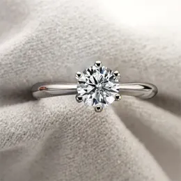 Bröllopsringar Iogou Ring Woman Trends 1 Carat Mosanite Solitaire Förlovningsring med certifikat 925 Silver 18K Vittguld Fina smycken 230301
