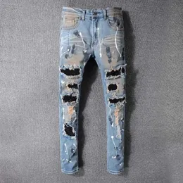 Jeans da uomo Hip Hop elasticizzati retrò blu dipinti skinny jeans di cotone pantaloni strappati moda streetwear bucato lavato Y2303