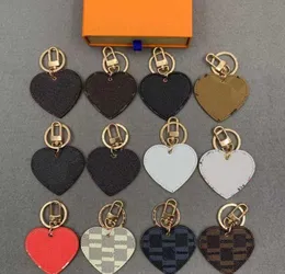 Nyckelkedja Lanyards Brand Classic Luxurys Keychain Heart Shape Brand Brown Black Flower Grid Designer Car Keyring Womens Fibbia Keychains Handmade Fashion