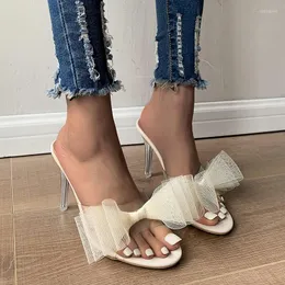 Tofflor höga klackar båge kvinnor skor sommar designer transparenta pumpar klänning party slingback glides ladies chaussures 2023