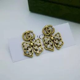 Fashion Collection 2023 New Luxury High Quality Fashion Jewelry for Light luxury classic old diamond inlaid bow ancient family design double earrings