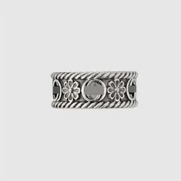 Modekollektion 2023 Ny lyxig högkvalitativ modesmycken för ihåliga ut dubbel sterling silver stekt degvridningar ring enkel stil daisy carving trend