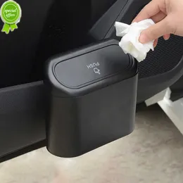 Nuovo tipo di pressatura per auto mini cestino per la spazzatura del cestino Organizzatore Garbage Case di polvere Casella di stoccaggio ABS Cash Can Auto Accessori per interni automatici