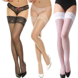 Silk Strumpor Sexig spets lår Hög strumpa Kvinnor Sommar över knästrumpor Sexig tjej Kvinnlig Hosiery Nylon Lace Style Stay Up Stockings