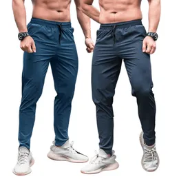 Мужские брюки мужчины спортивные брюки с карманами.