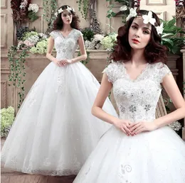 Abito da sposa cinese con scollo a V Bellissime applicazioni di pizzo Abito da ricamo Real Po Abiti da sposa Colore bianco 2023 Ball