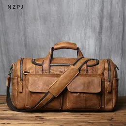 Sacchi di roba NZPJ Borsa da viaggio a mano da uomo retrò Borsa da viaggio in pelle Strato superiore Pelle bovina Borsa a tracolla monospalla di grande capacità Laptop casual 230309