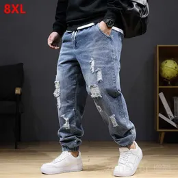 Jeans masculino jeans tamanho grande seção outono inverno masculino elástico cintura alta mais calças com buraco 8XL 7XL rasgado Y2303