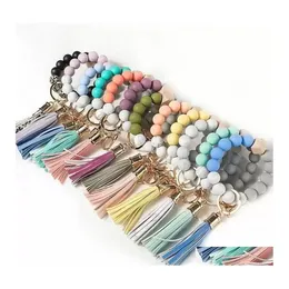 Party Favor Stock Wooden Tassel Bead String Bracelets Keychain Sile Beads Women Girl Key Ring Wrist Strap For Car Chain Wristlet RRA