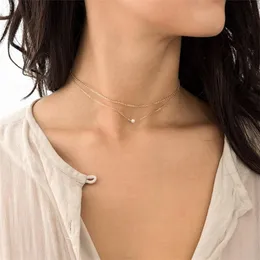 Подвесные ожерелья Jujie 2pcs Слоистые ювелирные украшения Золотое жемчужное ожерелье для женщин Простые геометрические женские модные чокеры подарки