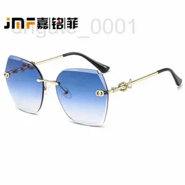 Sonnenbrillen-Designer Neue elegante Damen-Bogenset-Diamantschliff-Randlosbrille UE60