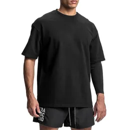 2023 Letnie męskie koszule Summer Gym Mens Muscleguys koszulka fitness T-shirt marka odzieży bawełniany krótkie rękawowe bluza sport