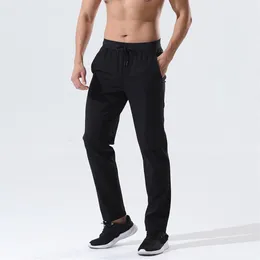 Calças de ioga esportiva masculina que executa o treinamento de fitness de fitness Basketball futebol longa leggings elásticos calças de secagem rápida266s