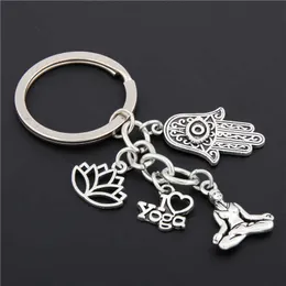 Nyckelringar 1pc silverfärg Jag älskar Yoga Keychain Hamsa Hand Charms Ohm Symbol Keyring Lotus Jewelry OM Handbag Jewelry E1658/E1694 R230311