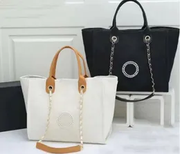 Marka designerska klasyczna cha plażowe torby na płótnie Pearl Evening Bag luksusowe przenośne zakupy duże torebki torebki torebki etykieta plecak plecak plecak satchel ch002