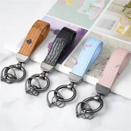 Luxury Car Keychain Bag Pinging Charm Jewelry Flor Key Ring Holder para homens homens Moda Pu Leather Animal Tassel Chain Chain Acc1612