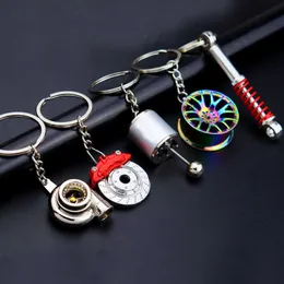 Keychains Creative Gift Car Metal Keychain Tuo Gear Hub Pendant Brake Disc Sho Absoer Pendant L230314