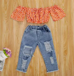 夏の幼児デザイナーの服は子供の女の子の服を肩のオレンジ色の花の印刷物Tシャツデニムパンツ衣装2pcs