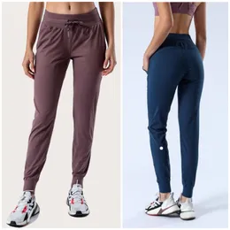 LL-2079 Kadınlar Uzun Pantolon Pantolon Yoga Kıyafet Gevşek Dokuzuncu Pantolon Tulun Spor Spor Salonu Çalışma Sıradan Ayak Bileği Bantlı Pantolon Elastik Elastik Yüksek Bel Drawstring Nefes Alabilir